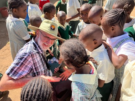 Martin greets the children